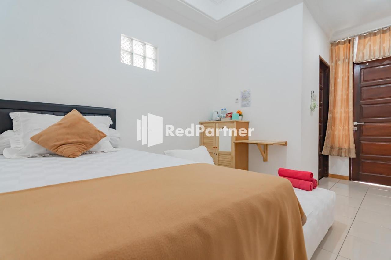Langkar Guest House Syariah Mitra Reddoorz サマリンダ エクステリア 写真